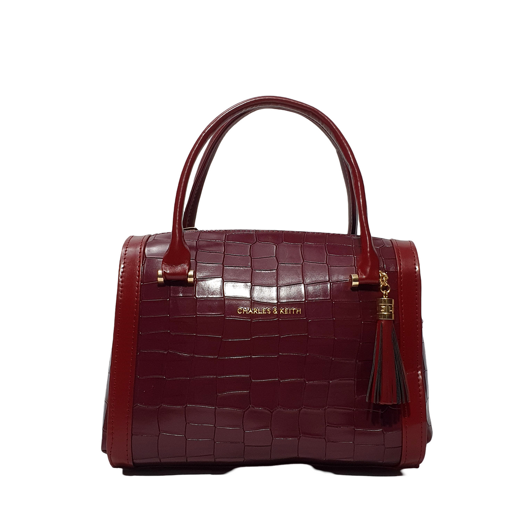 Luxurious Croc-Embossed Barrel Bags