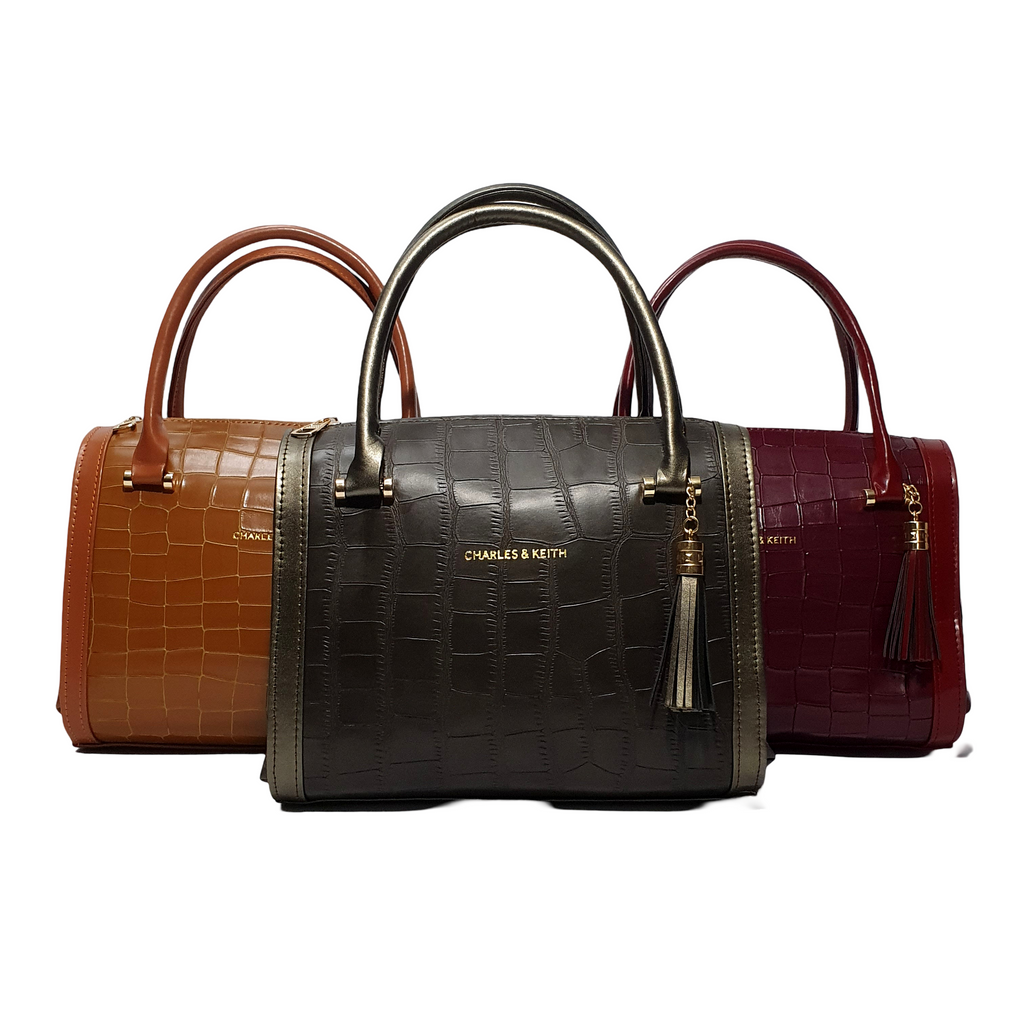 Luxurious Croc-Embossed Barrel Bags