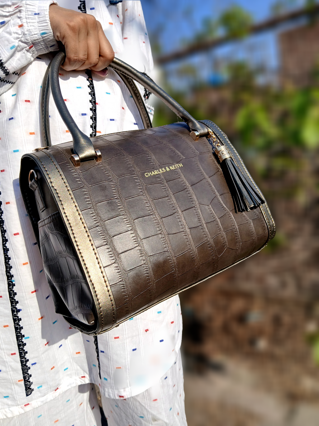 Luxurious Croc-Embossed Barrel Bags